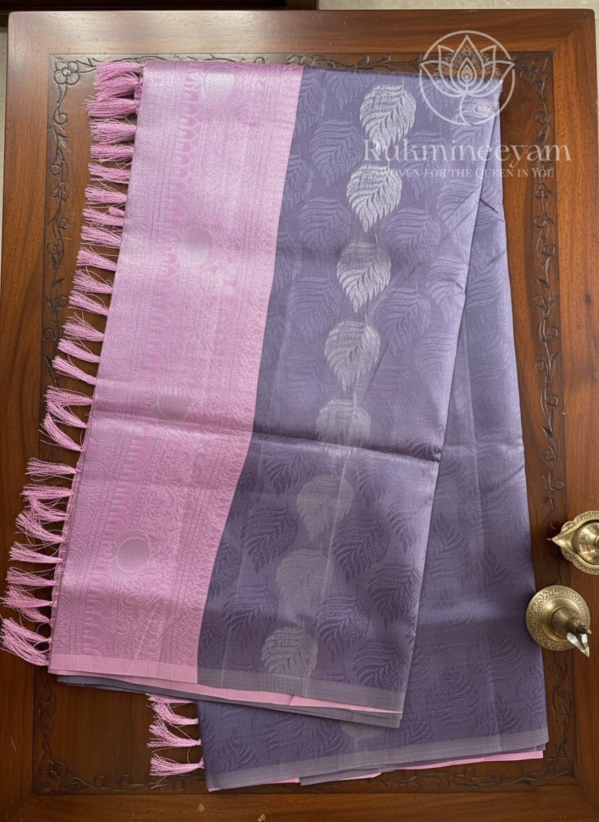 Lavender sari with pink pallu and pink blouse