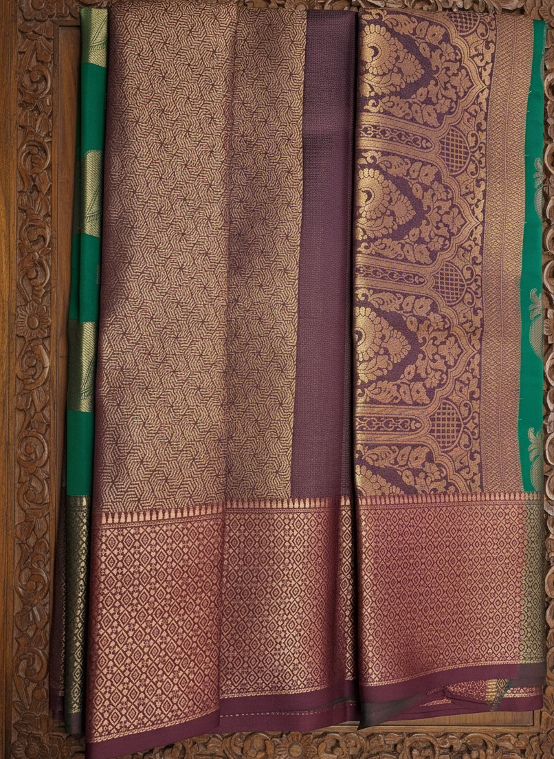 Emerald Green Pattu Saree with Maroon Zari Design