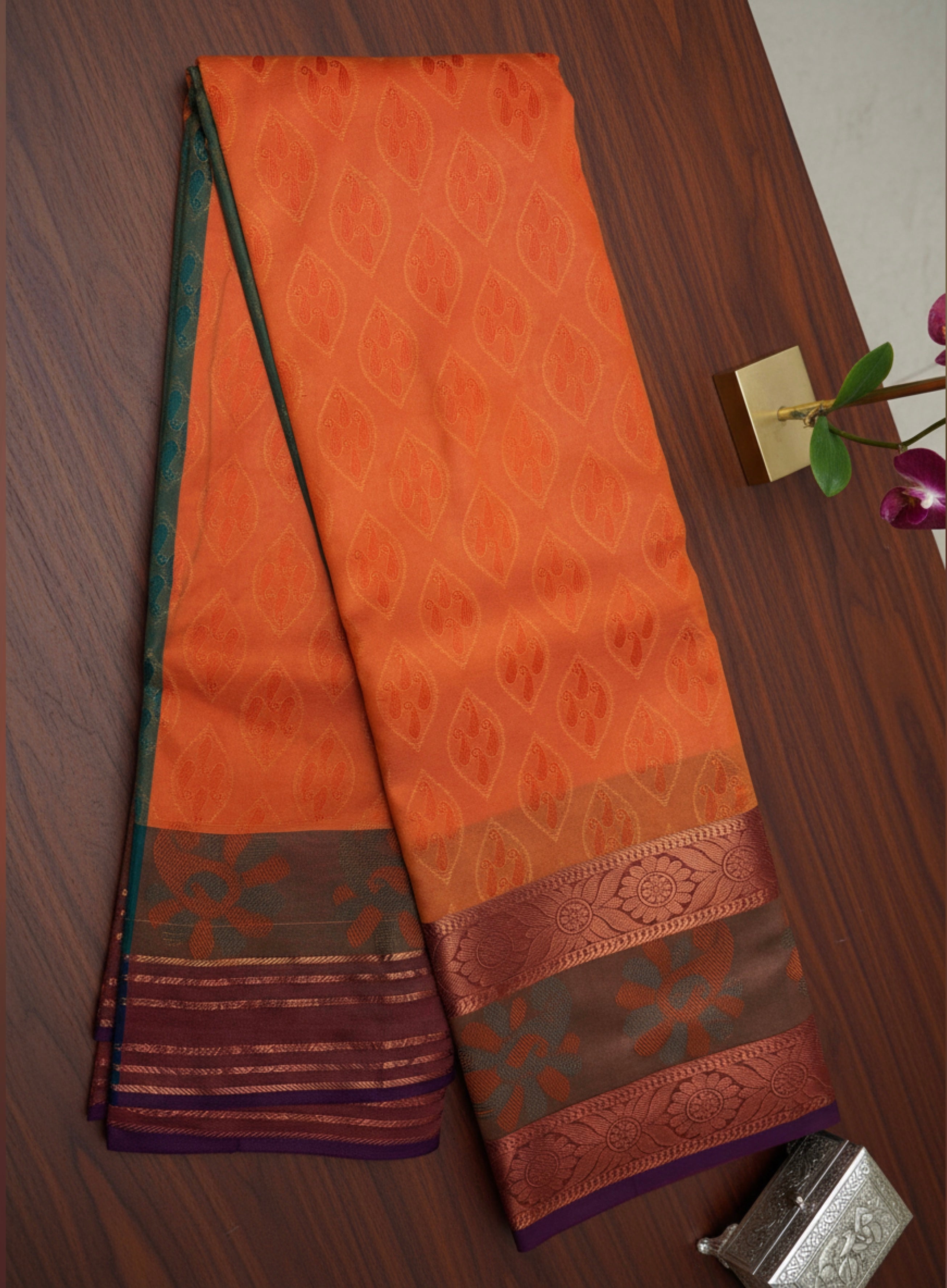 Vibrant Orange Silk Saree with Contrast Zari Design