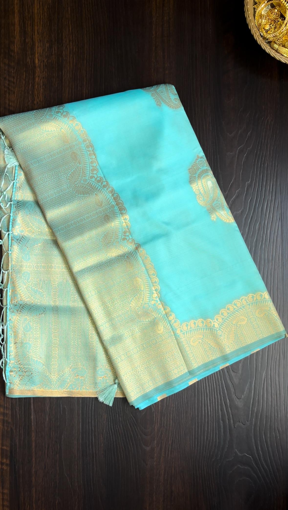 Teal Blue Silk Saree with Gold Zari Border & Tassels