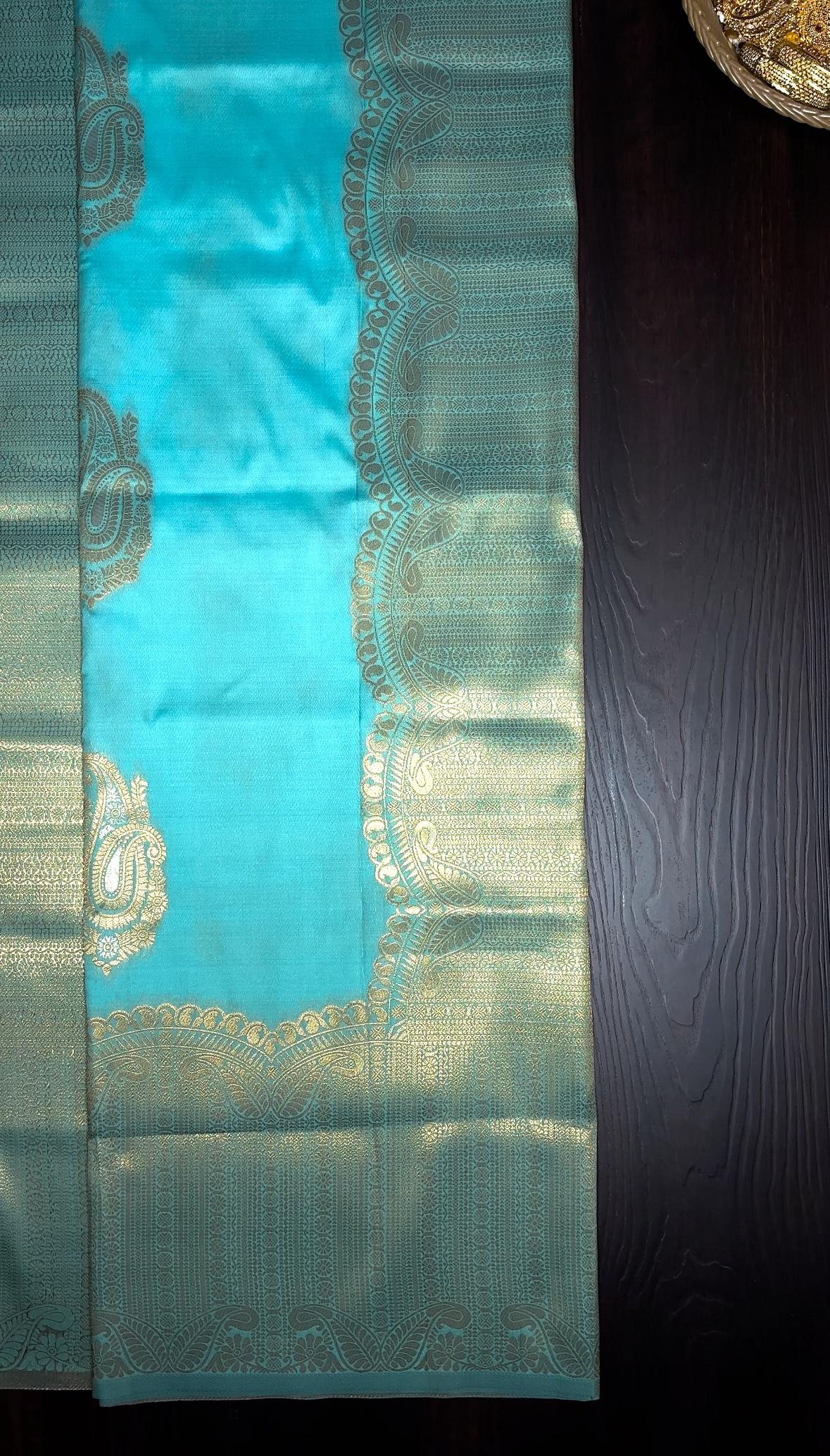 Teal Blue Silk Saree with Gold Zari Border & Tassels